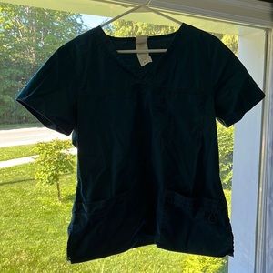 Blue Dickie’s scrub top small imperfection on back collar